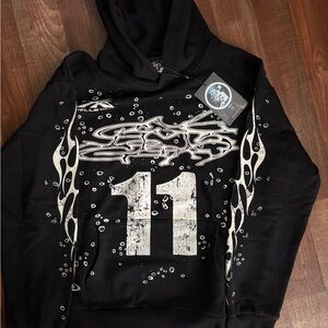 Black and White Graphic Sweatshirt with Tribal Design